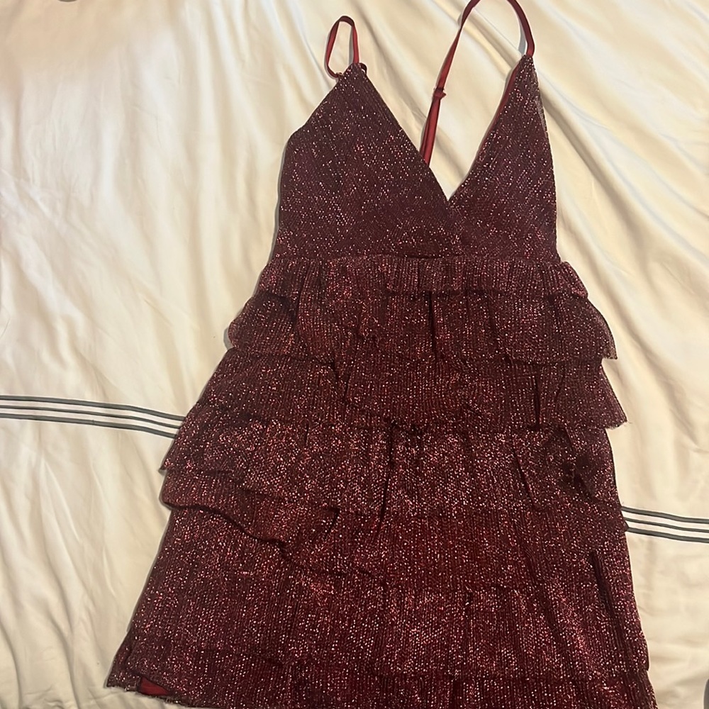 FunSparkly ruffle dress. Adjustable straps. V neck.